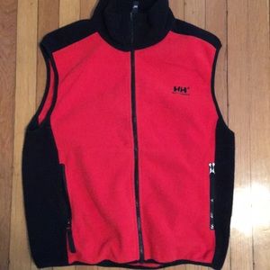 Red and black fuzzy vest.